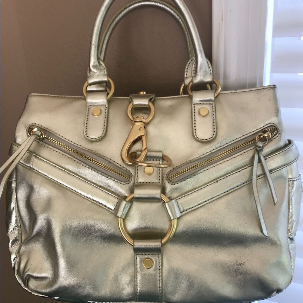 BCBG gold leather bag slightly used $100